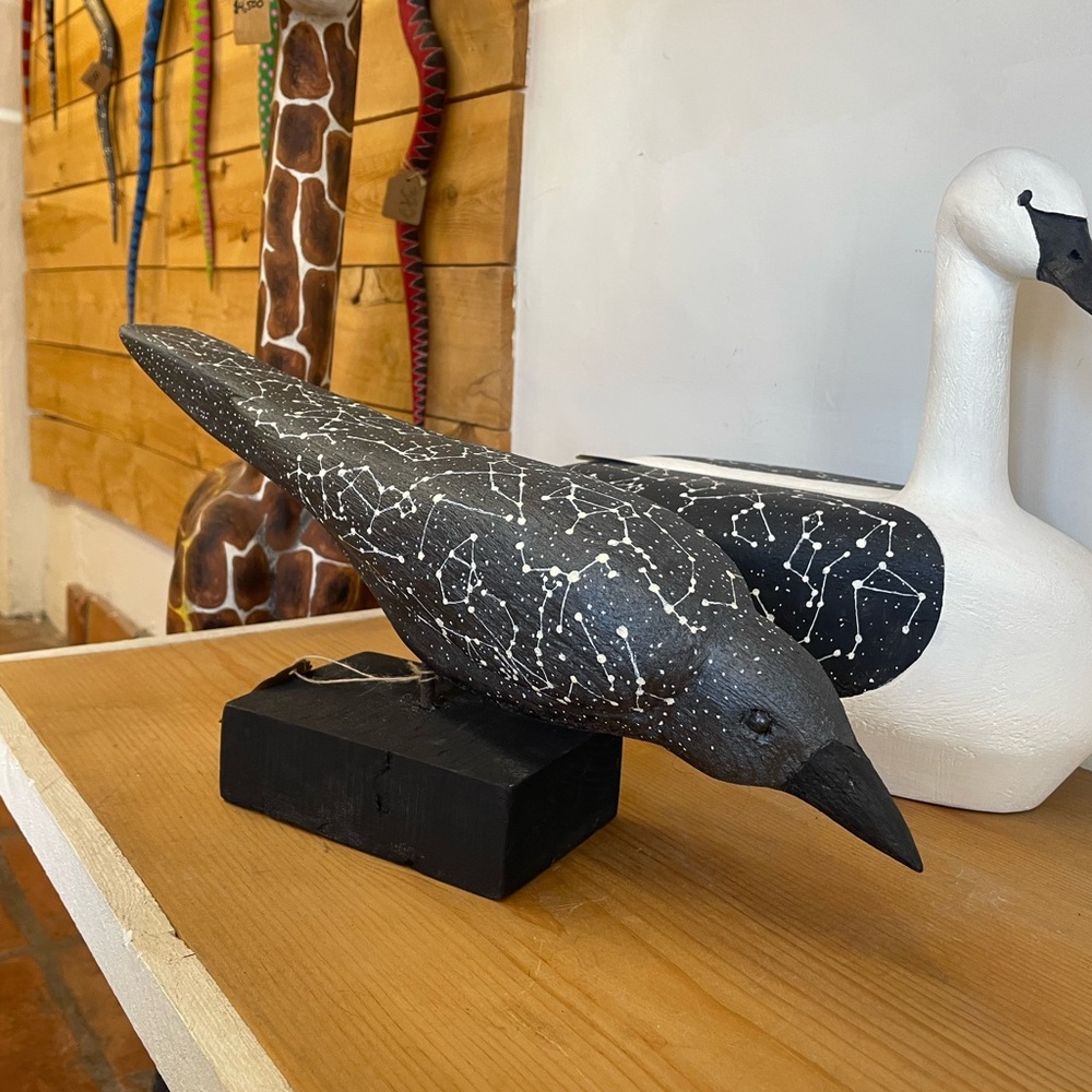 Constellation raven by famous New Mexico artist Paul Lutonsky. Hand carved
